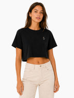Duck crop top worn cropped silhouette paired with high waisted jeans