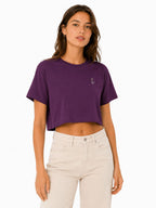 Duck crop top worn cropped silhouette paired with high-waisted jeans