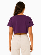 Duck crop top worn cropped silhouette paired with high waisted jeans