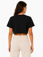 Duck crop top worn cropped silhouette paired with high waisted jeans