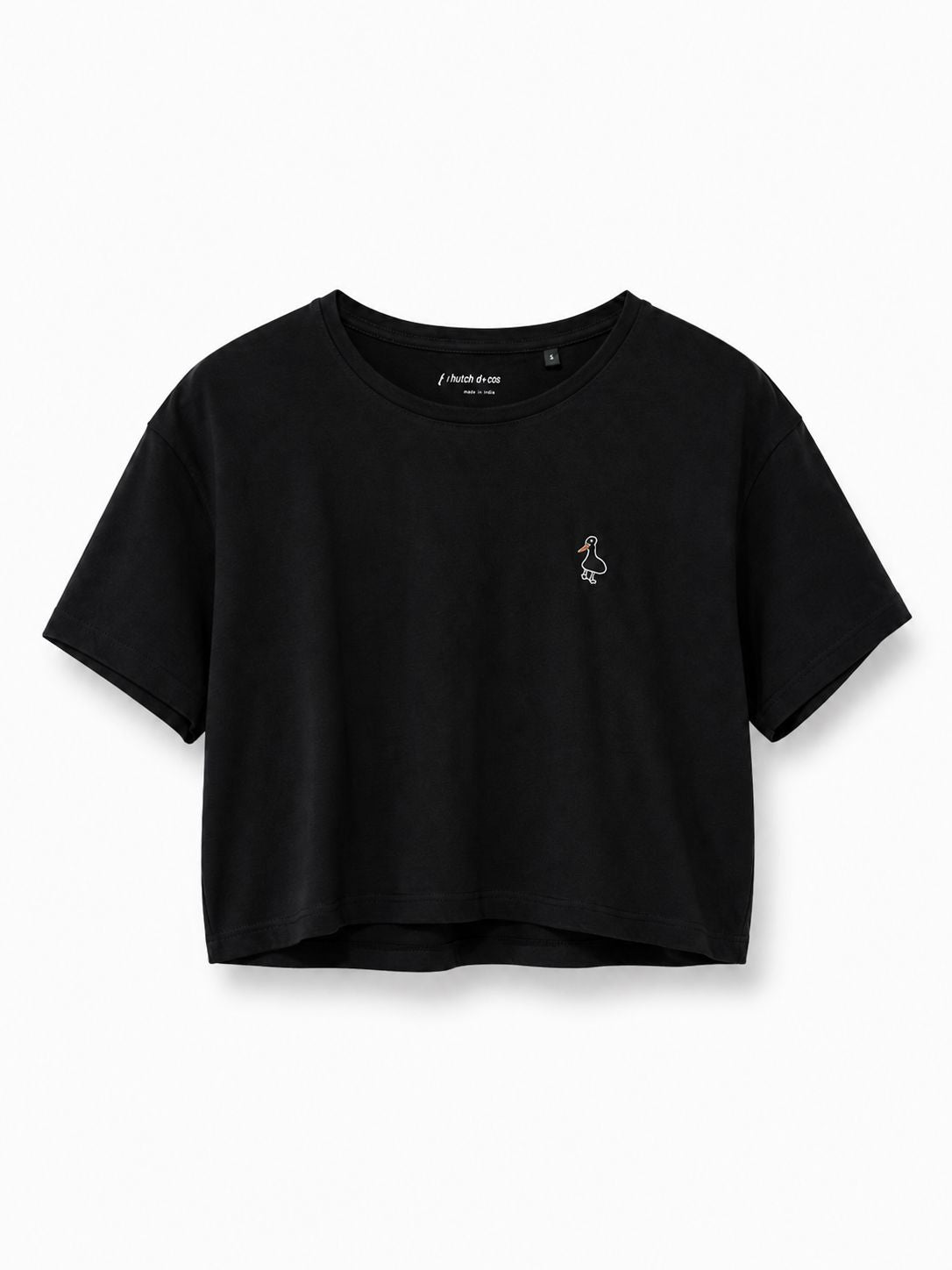 Duck crop top worn cropped silhouette paired with high waisted jeans