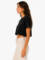 Duck crop top worn cropped silhouette paired with high waisted jeans