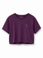Duck crop top worn cropped silhouette paired with high-waisted jeans