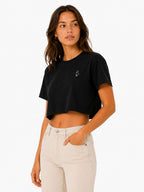 Duck crop top worn cropped silhouette paired with high waisted jeans