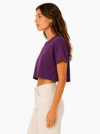 Duck crop top worn cropped silhouette paired with high waisted jeans
